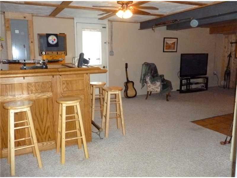 315 Backbone Road Clinton, PA 15026 - Photo 20 of 22 Den/Family/Great Room. Bar to the left