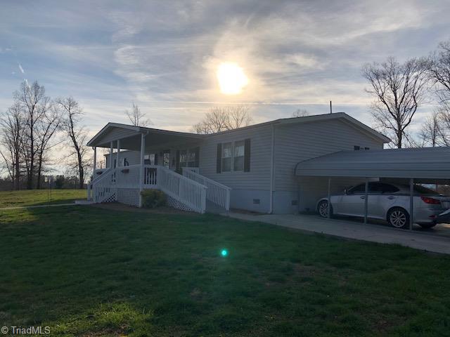 893 Brewer Road Hays, NC 28635 - Photo 2 of 25 Concrete Drive, Metal Carport Conveys