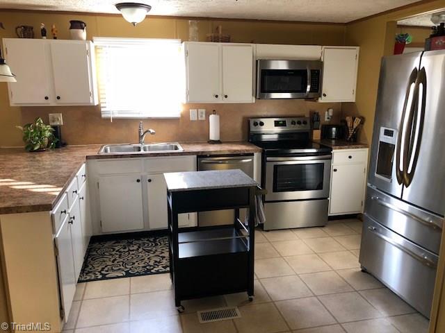 893 Brewer Road Hays, NC 28635 - Photo 16 of 25 Updated Kitchen with newer counter tops and Stainl