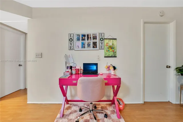a workspace with a table and chair