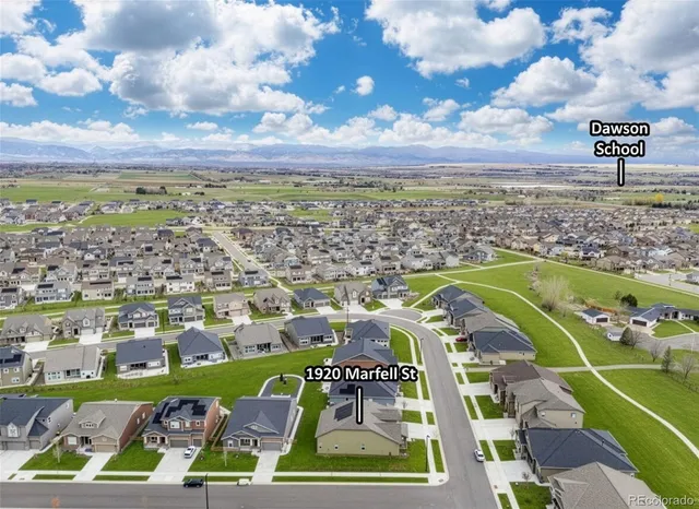 a view of a golf course with a lake view