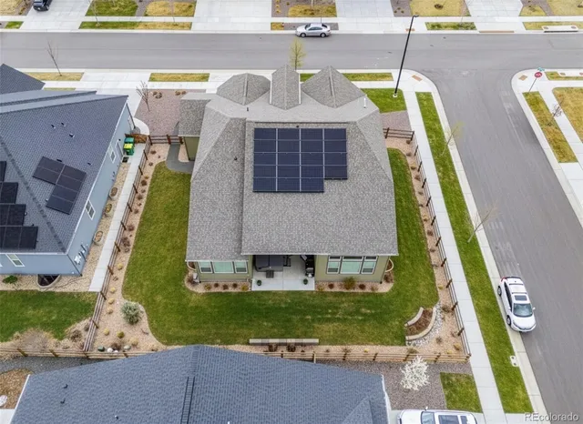 a aerial view of a house with a swimming pool