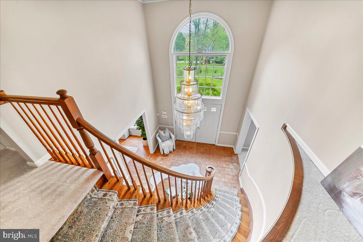 1750 Stocton Road Jenkintown, PA 19046 - Photo 30 of 50 Elegant staircase with grand chandelier.