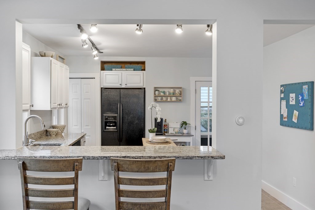 18 King Street, Unit 1 Swampscott, MA 01907 - Photo 11 of 27 a bathroom with a sink and a mirror
