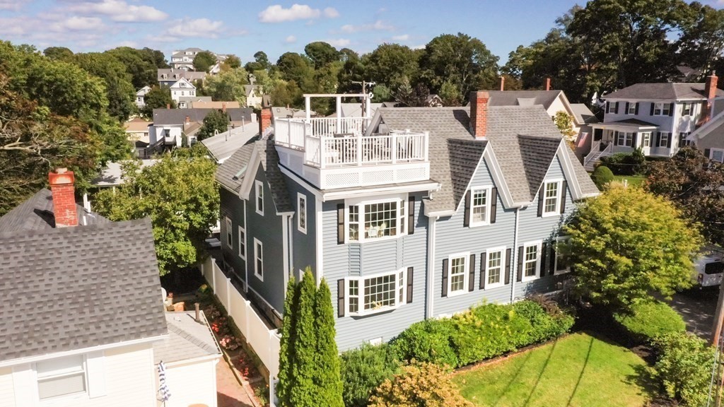18 King Street, Unit 1 Swampscott, MA 01907 - Photo 2 of 27 front view of a house with a garden
