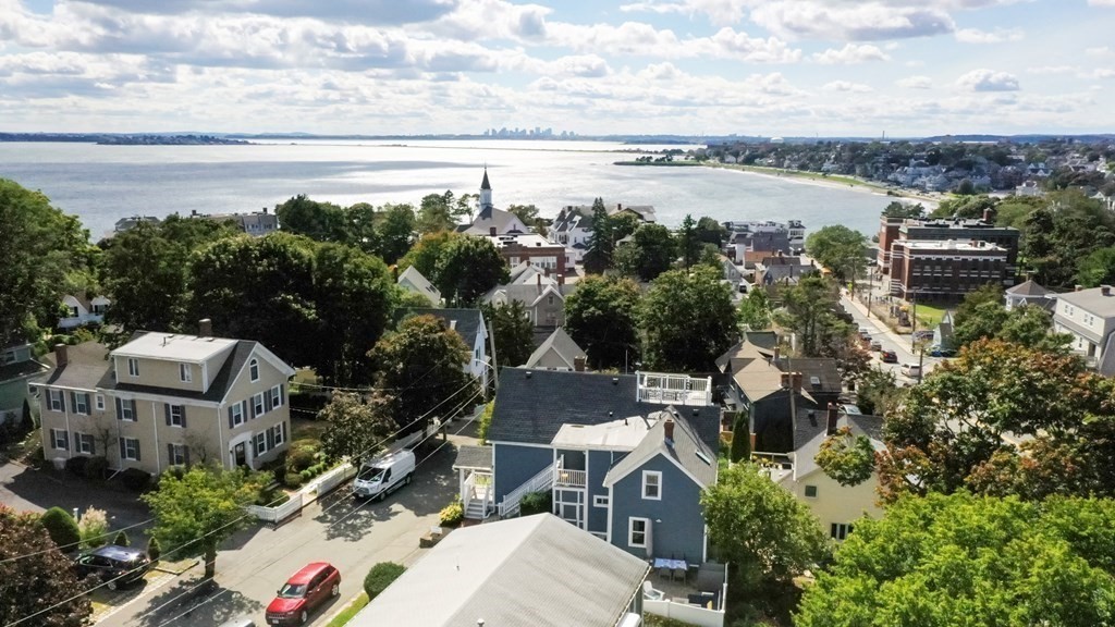 18 King Street, Unit 1 Swampscott, MA 01907 - Photo 3 of 27 a view of lake and houses with outdoor space