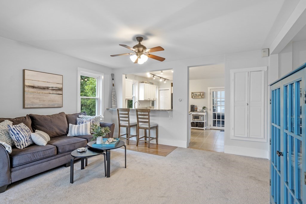 18 King Street, Unit 1 Swampscott, MA 01907 - Photo 7 of 27 a living room with furniture and wooden floor