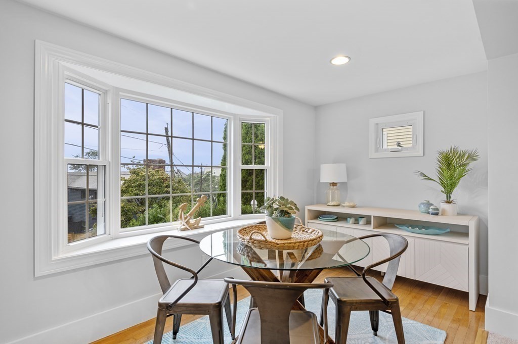 18 King Street, Unit 1 Swampscott, MA 01907 - Photo 8 of 27 a dining room with furniture and window