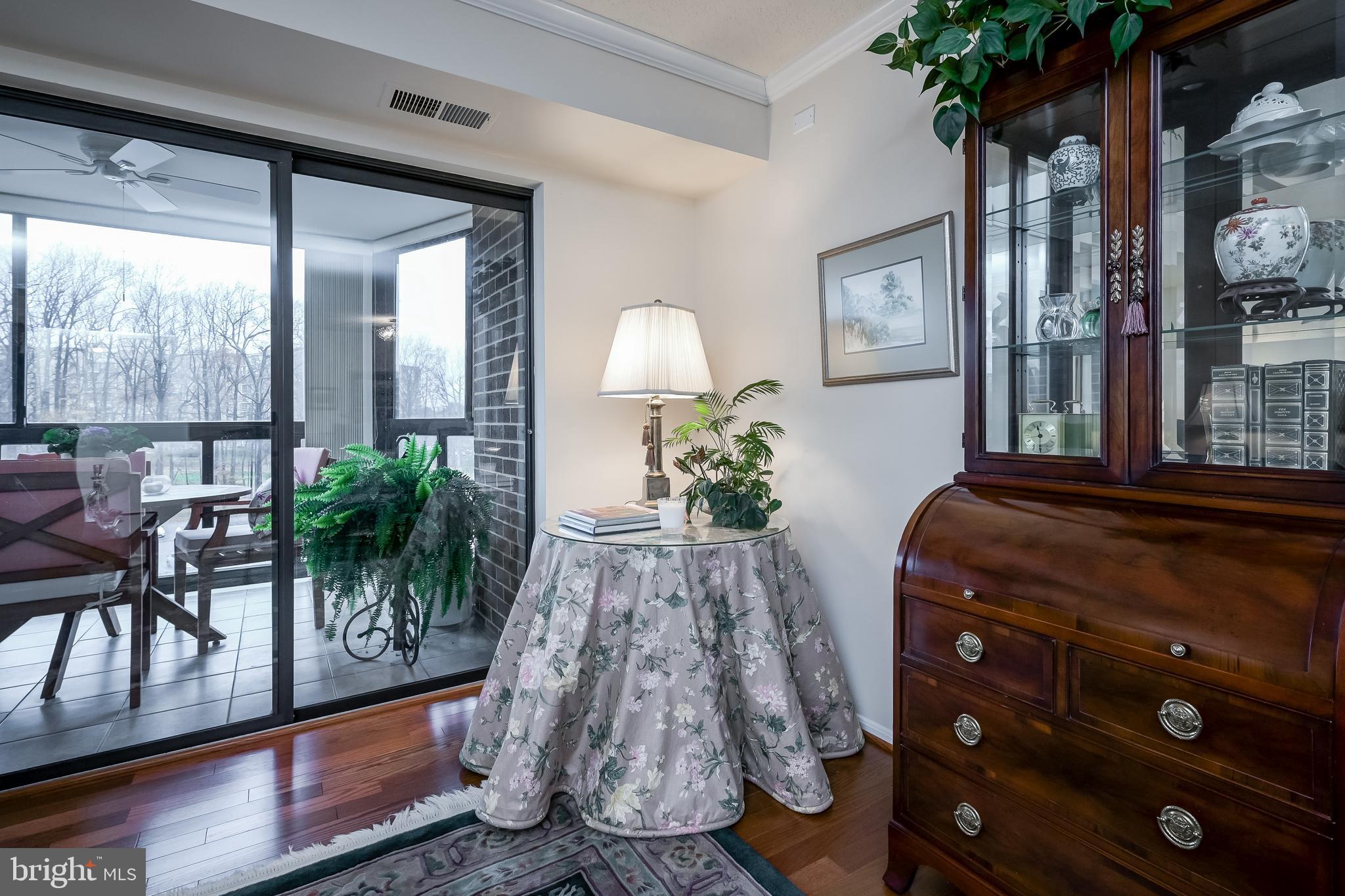 15100 Interlachen Drive, Unit 4521 Silver Spring, MD 20906 - Photo 15 of 44 Looking towards glass doors of large patio