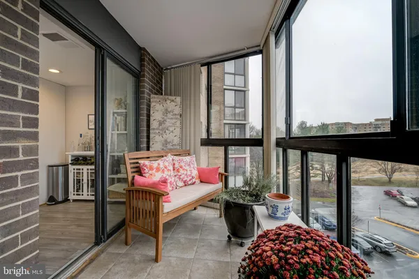 a bedroom with furniture and windows