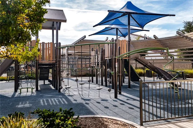a view of a chairs and table in the patio