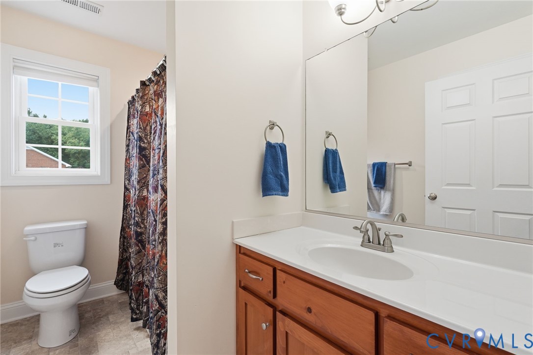 4937 Hurop Road Sandston, VA 23150 - Photo 28 of 55 Bathroom featuring a white vanity countertop with