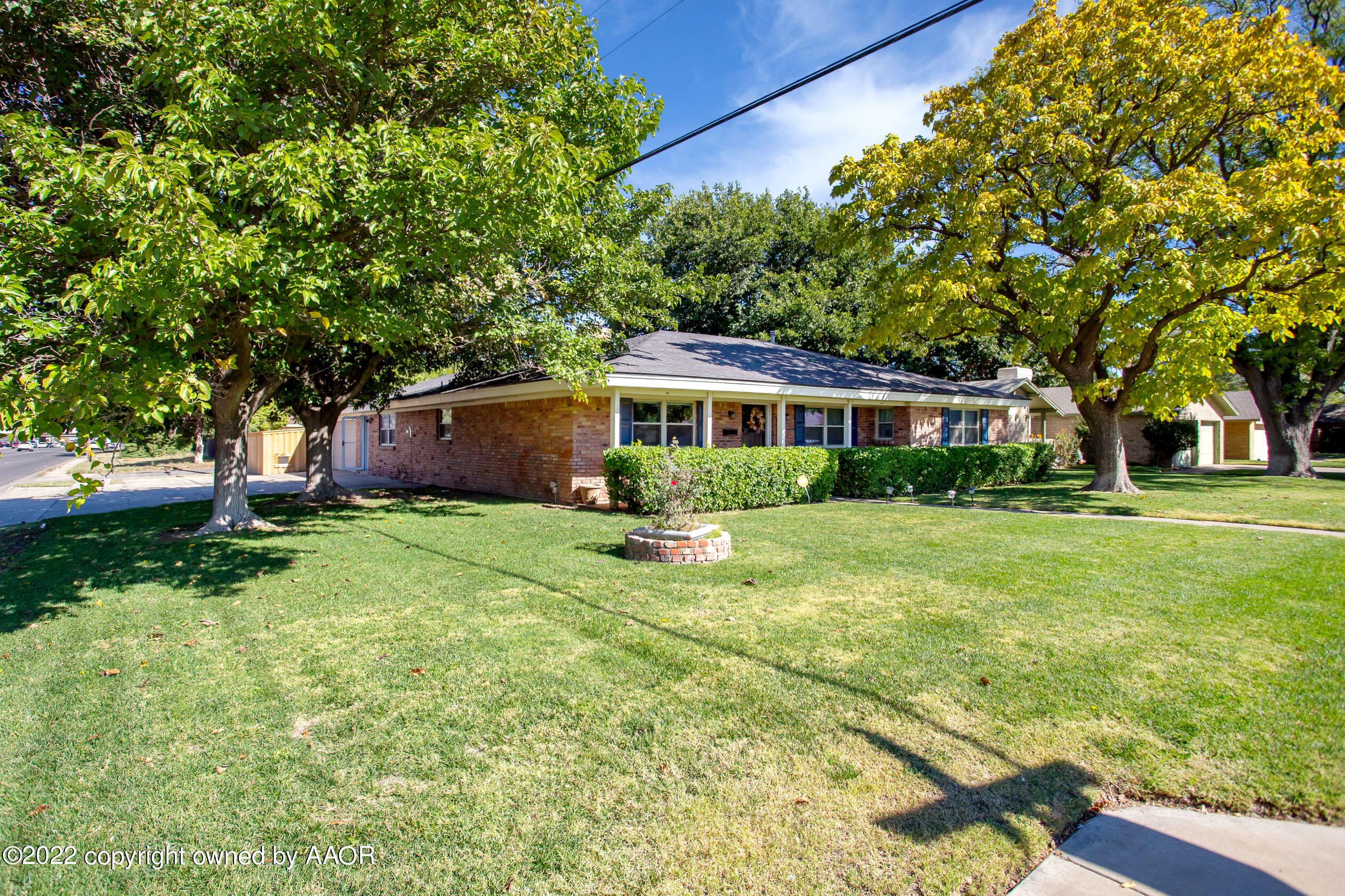 7214 Jameson Road Amarillo, TX 79106 - Photo 2 of 31 a view of house with yard and green space