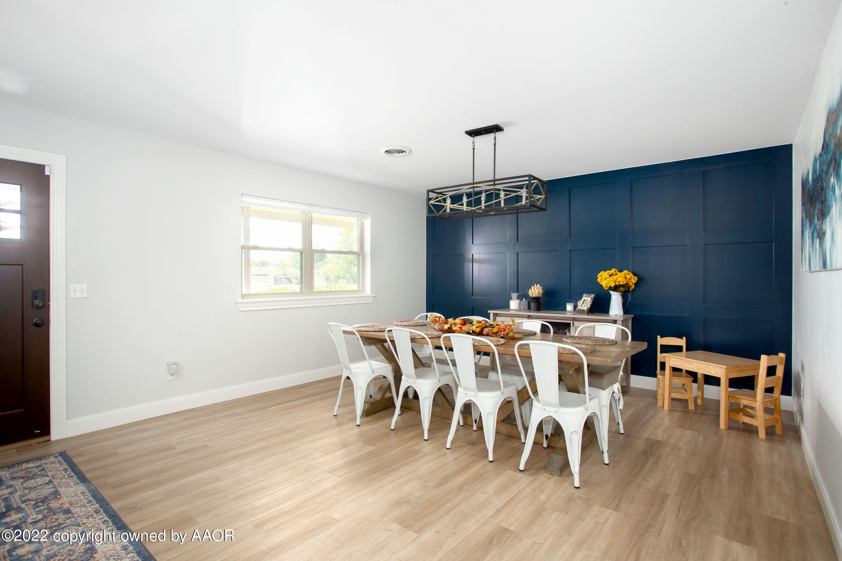 7214 Jameson Road Amarillo, TX 79106 - Photo 5 of 31 a view of a dining room with furniture and wooden floor