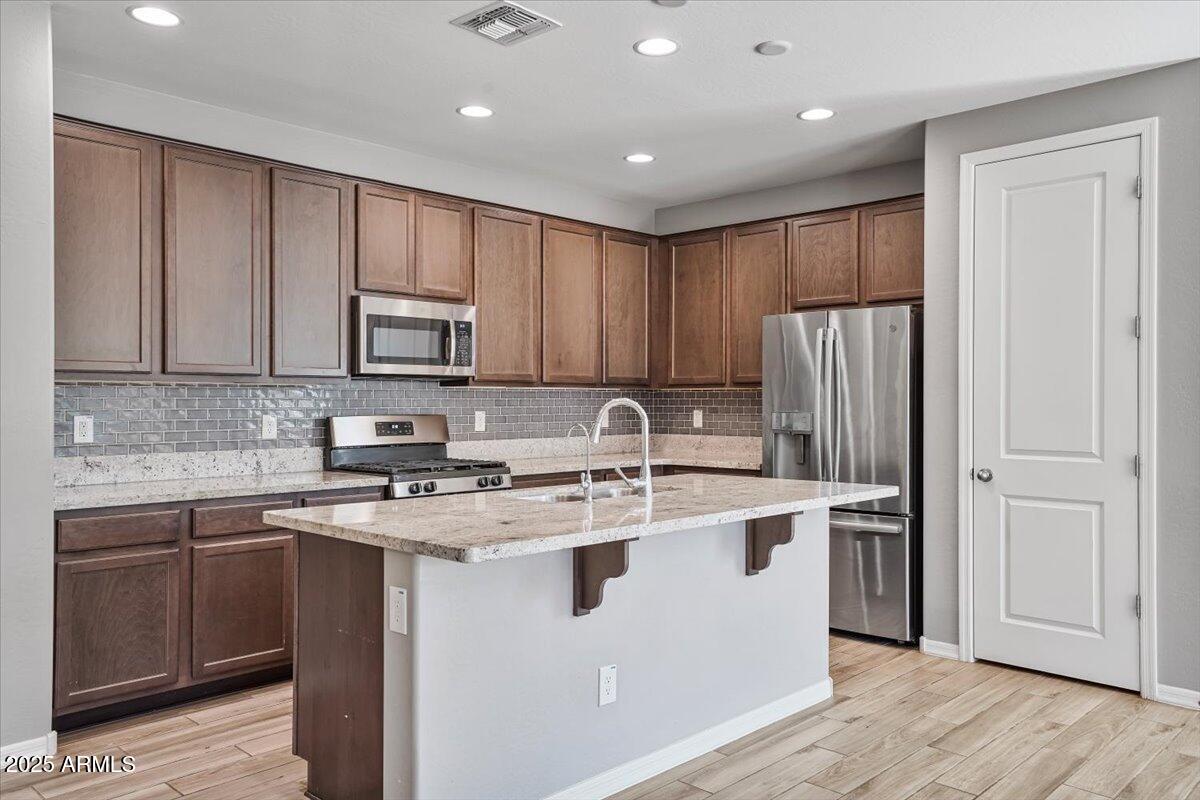 21038 West Almeria Road Buckeye, AZ 85396 - Photo 4 of 46 24-DSC02796