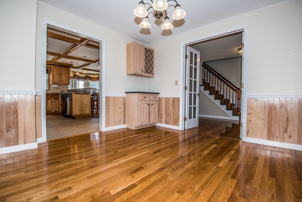 5 Twin Brooks Road Salisbury, MA 01952 - Photo 14 of 30 a view of a room with wooden floor and staircase