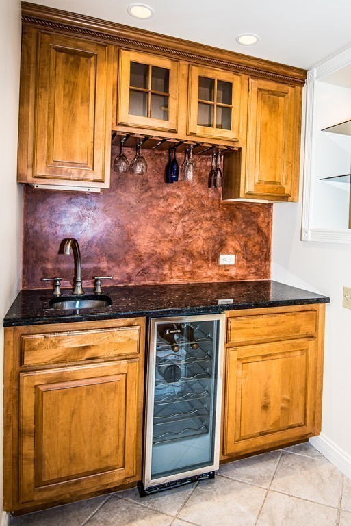 5 Twin Brooks Road Salisbury, MA 01952 - Photo 17 of 30 a kitchen with stainless steel appliances granite countertop a stove and a microwave
