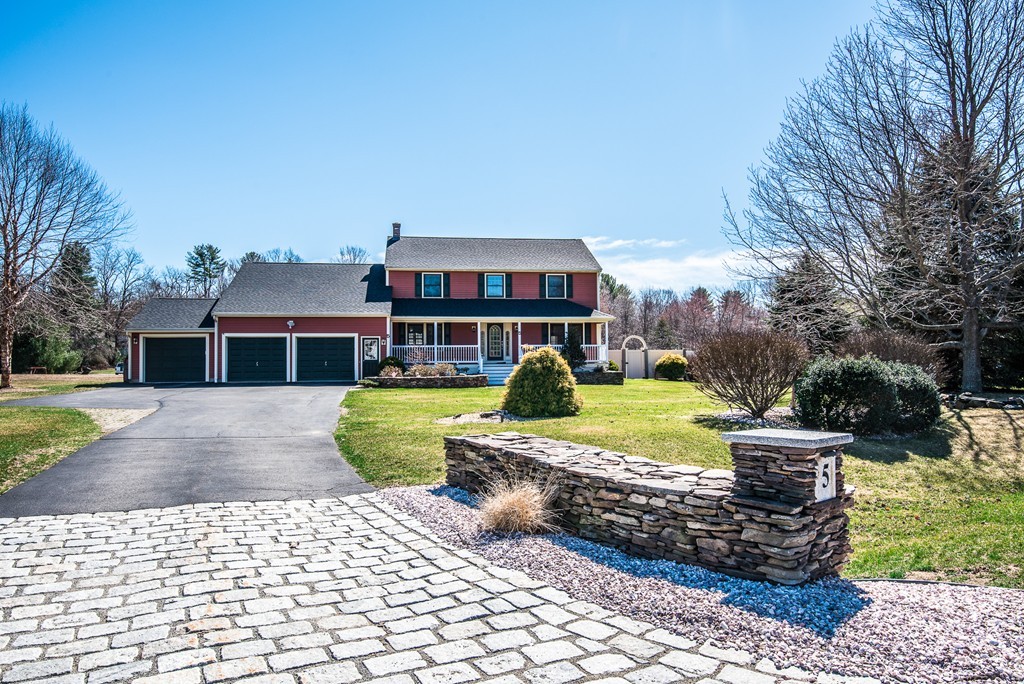 5 Twin Brooks Road Salisbury, MA 01952 - Photo 2 of 30 a front view of a house with a yard