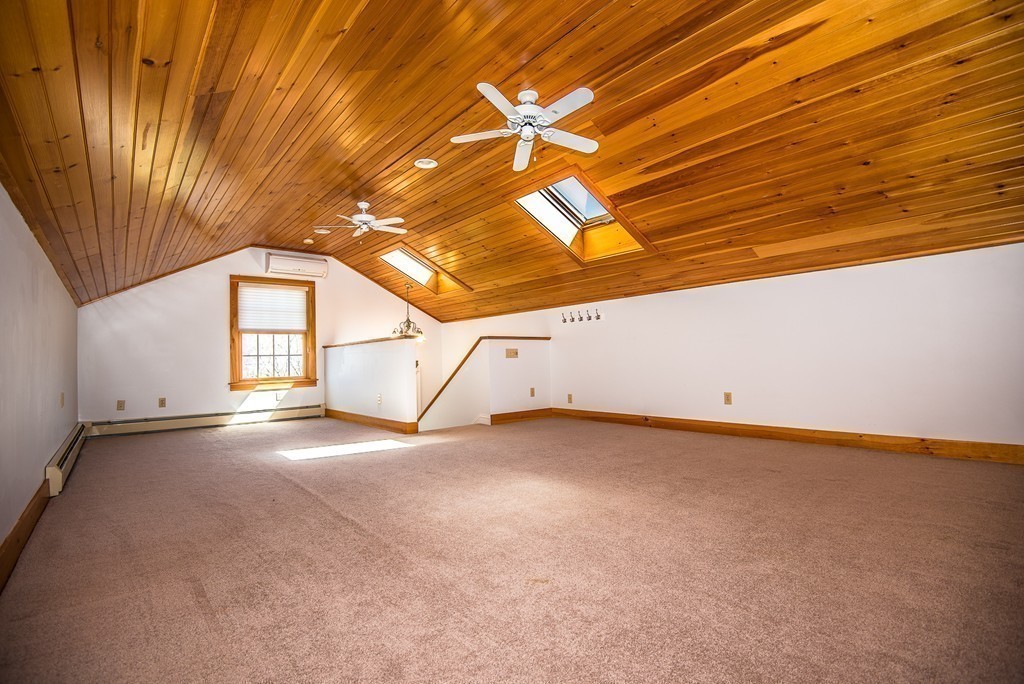 5 Twin Brooks Road Salisbury, MA 01952 - Photo 22 of 30 a view of a room with windows