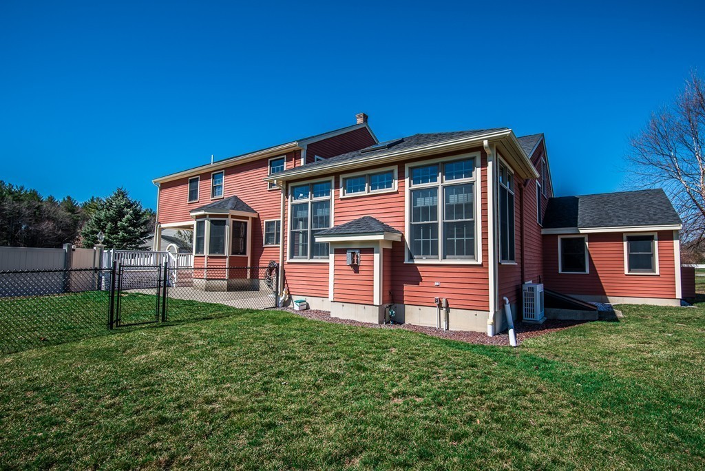 5 Twin Brooks Road Salisbury, MA 01952 - Photo 4 of 30 a front view of a house with a yard