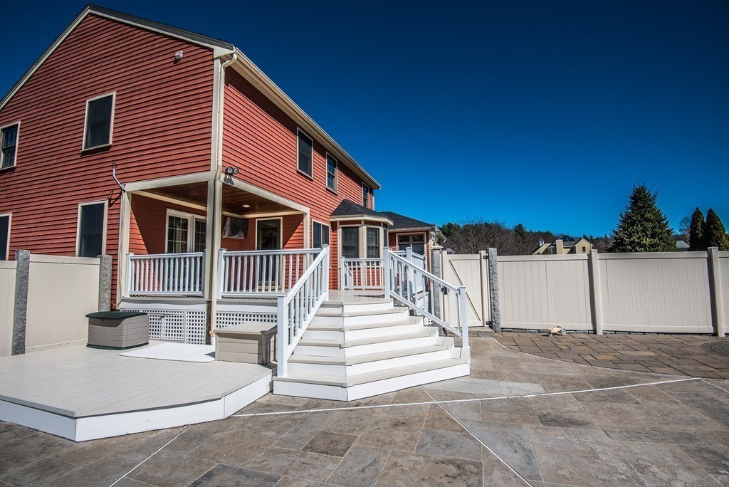 5 Twin Brooks Road Salisbury, MA 01952 - Photo 8 of 30 a view of a house with a backyard
