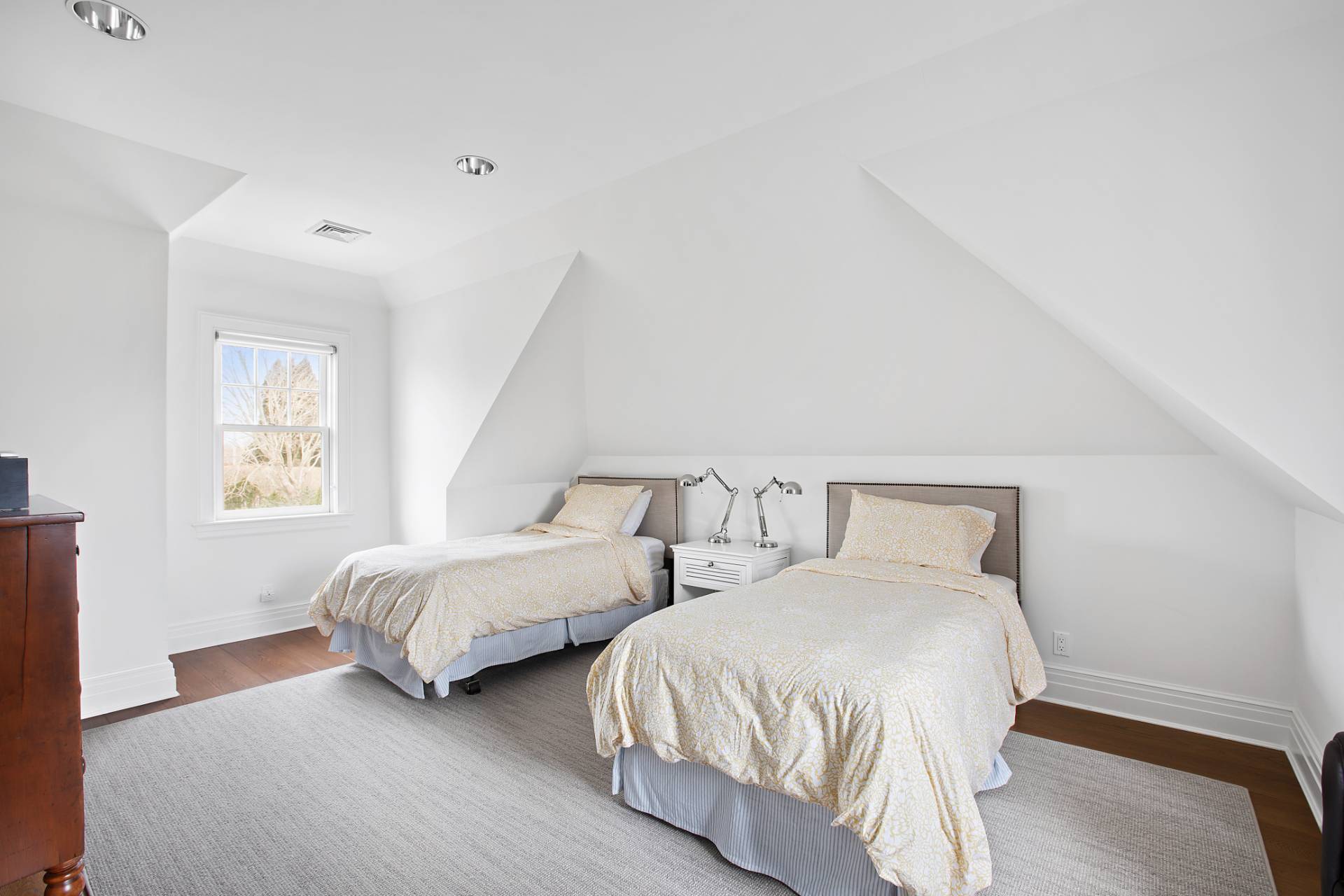 Undisclosed Address Water Mill, NY 11976 - Photo 19 of 26 a bedroom with two beds and a large window