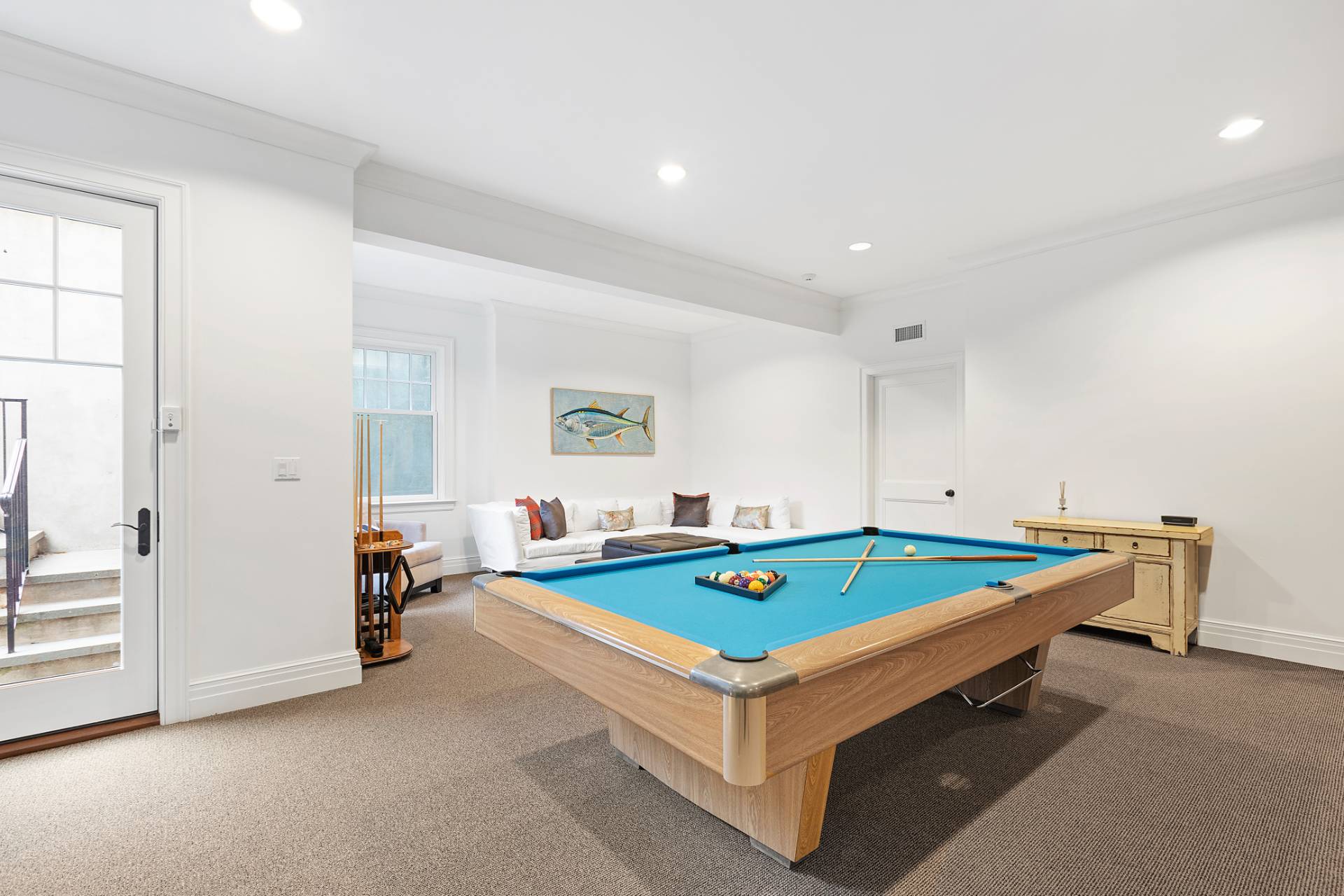 Undisclosed Address Water Mill, NY 11976 - Photo 21 of 26 a room with pool table and windows