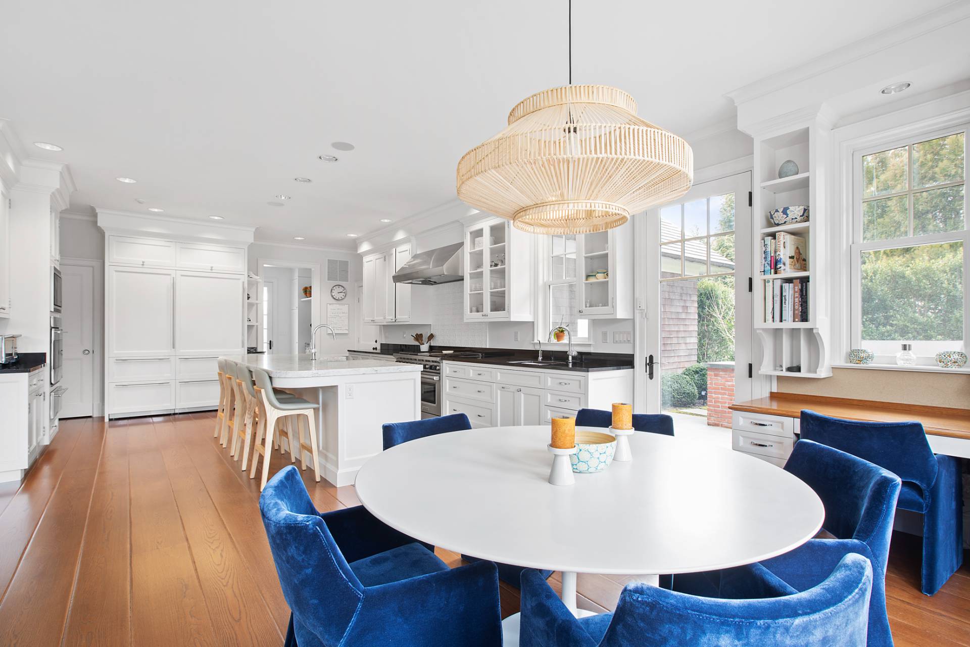Undisclosed Address Water Mill, NY 11976 - Photo 3 of 26 a large kitchen with a table and chairs
