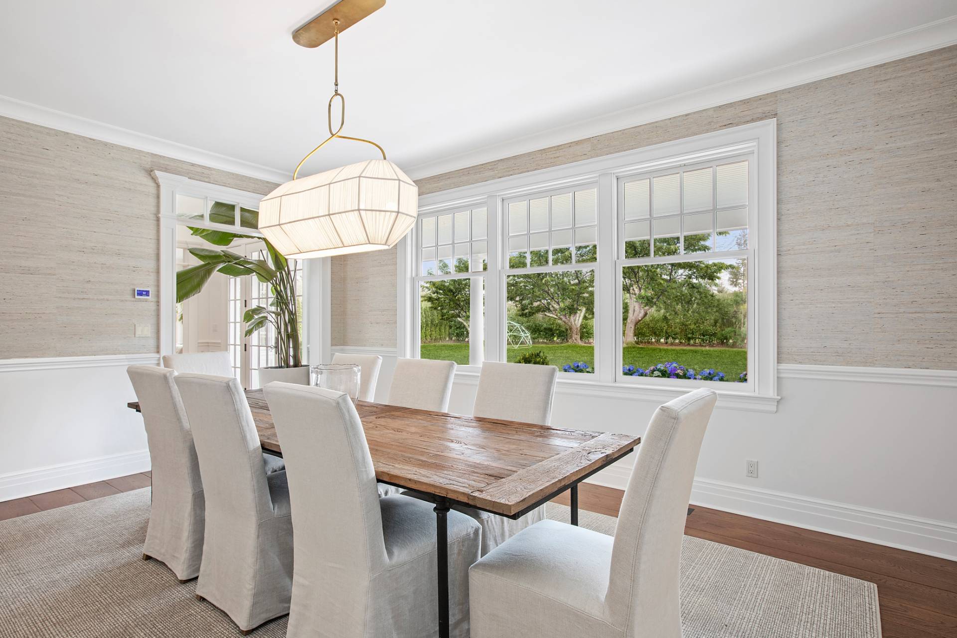 Undisclosed Address Water Mill, NY 11976 - Photo 5 of 26 a view of a dining room with furniture window and outside view