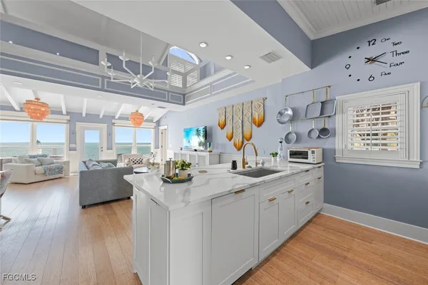 a view of center kitchen island with wooden floor