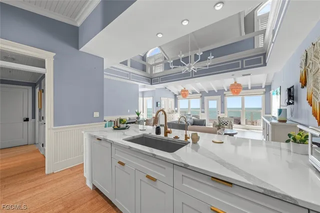 a kitchen with sink and window