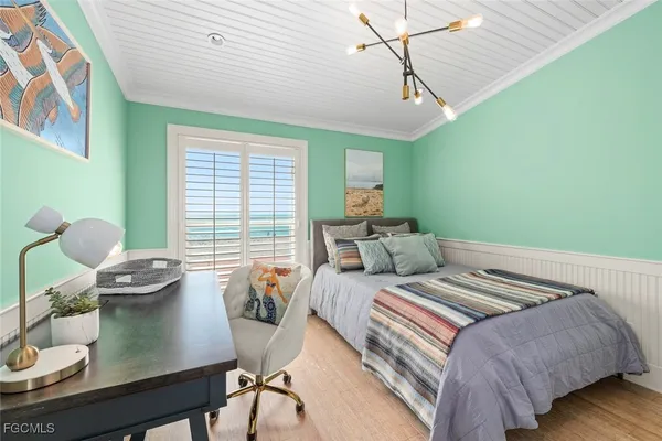 a bedroom with a bed and a table