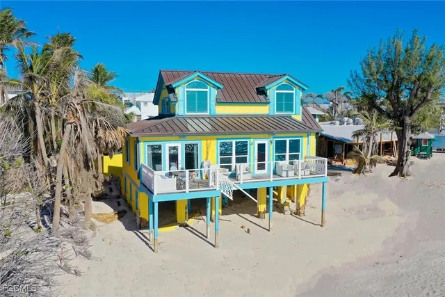a view of a house with sitting area
