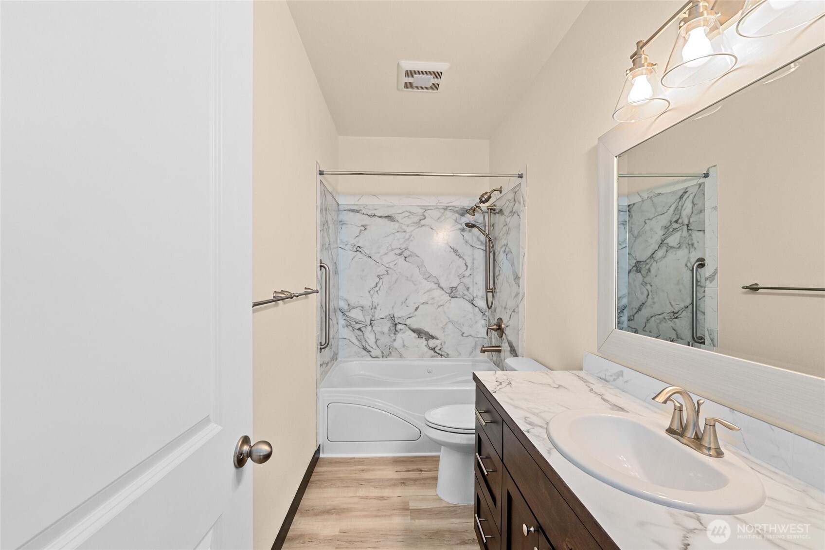 15 Miyoko Point Road Republic, WA 99166 - Photo 13 of 38 a bathroom with a granite countertop sink a toilet and shower