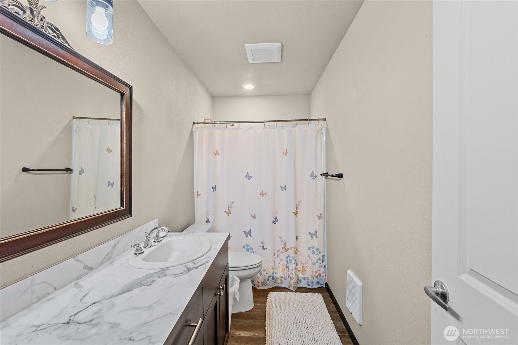 15 Miyoko Point Road Republic, WA 99166 - Photo 24 of 38 a bathroom with a sink a toilet a mirror and shower