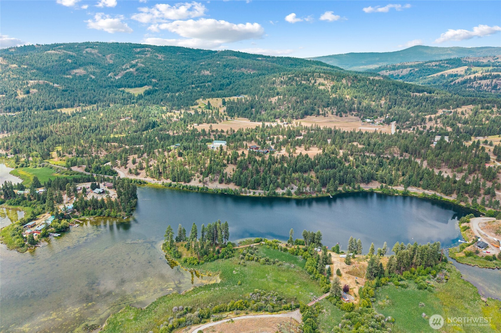 15 Miyoko Point Road Republic, WA 99166 - Photo 31 of 38 an aerial view of residential houses with outdoor space and lake view