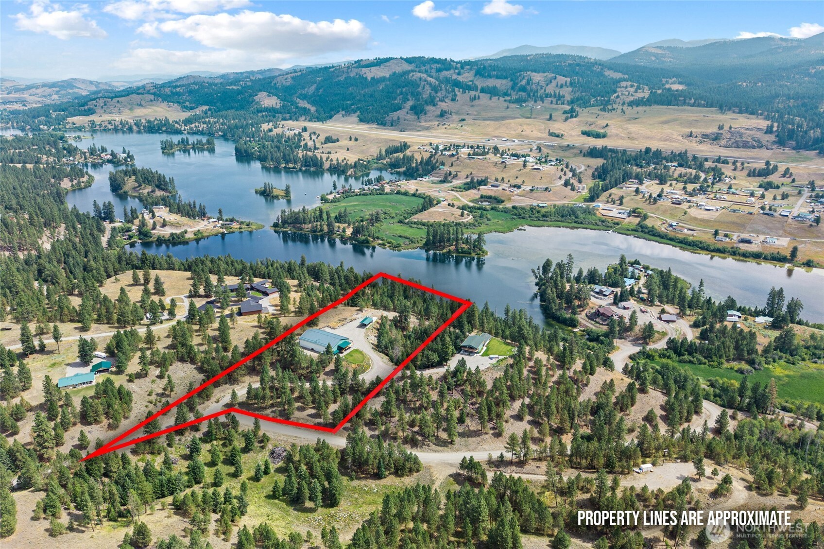 15 Miyoko Point Road Republic, WA 99166 - Photo 33 of 38 an aerial view of lake and residential houses