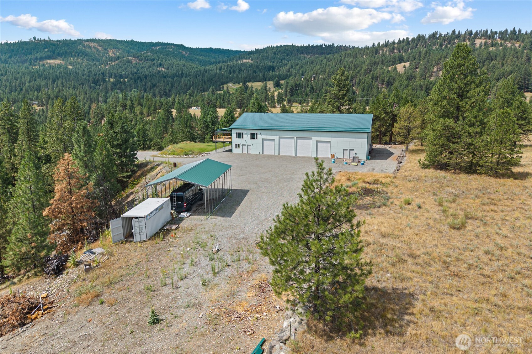 15 Miyoko Point Road Republic, WA 99166 - Photo 34 of 38 a view of a terrace with a garden and trees