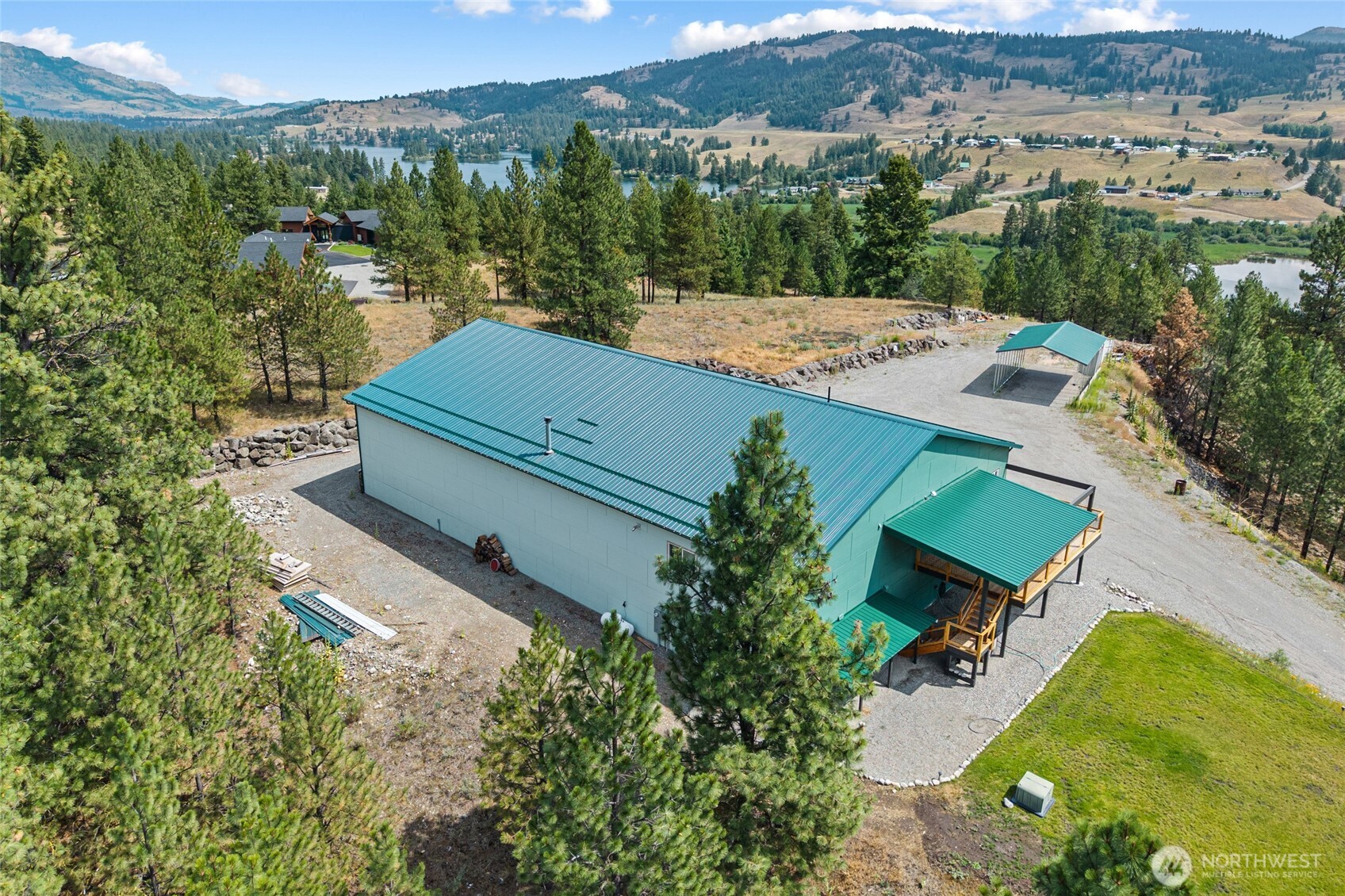 15 Miyoko Point Road Republic, WA 99166 - Photo 37 of 38 an aerial view of a house with a garden