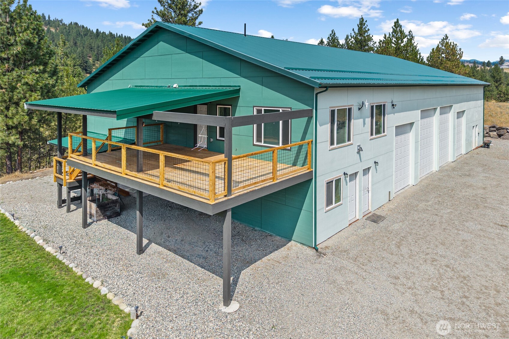 15 Miyoko Point Road Republic, WA 99166 - Photo 4 of 38 a front view of house with deck and yard