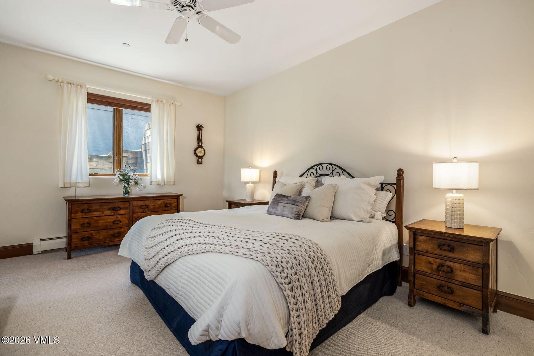 167 Saddle Ridge Edwards, CO 81632 - Photo 24 of 41 a bedroom with a bed and window
