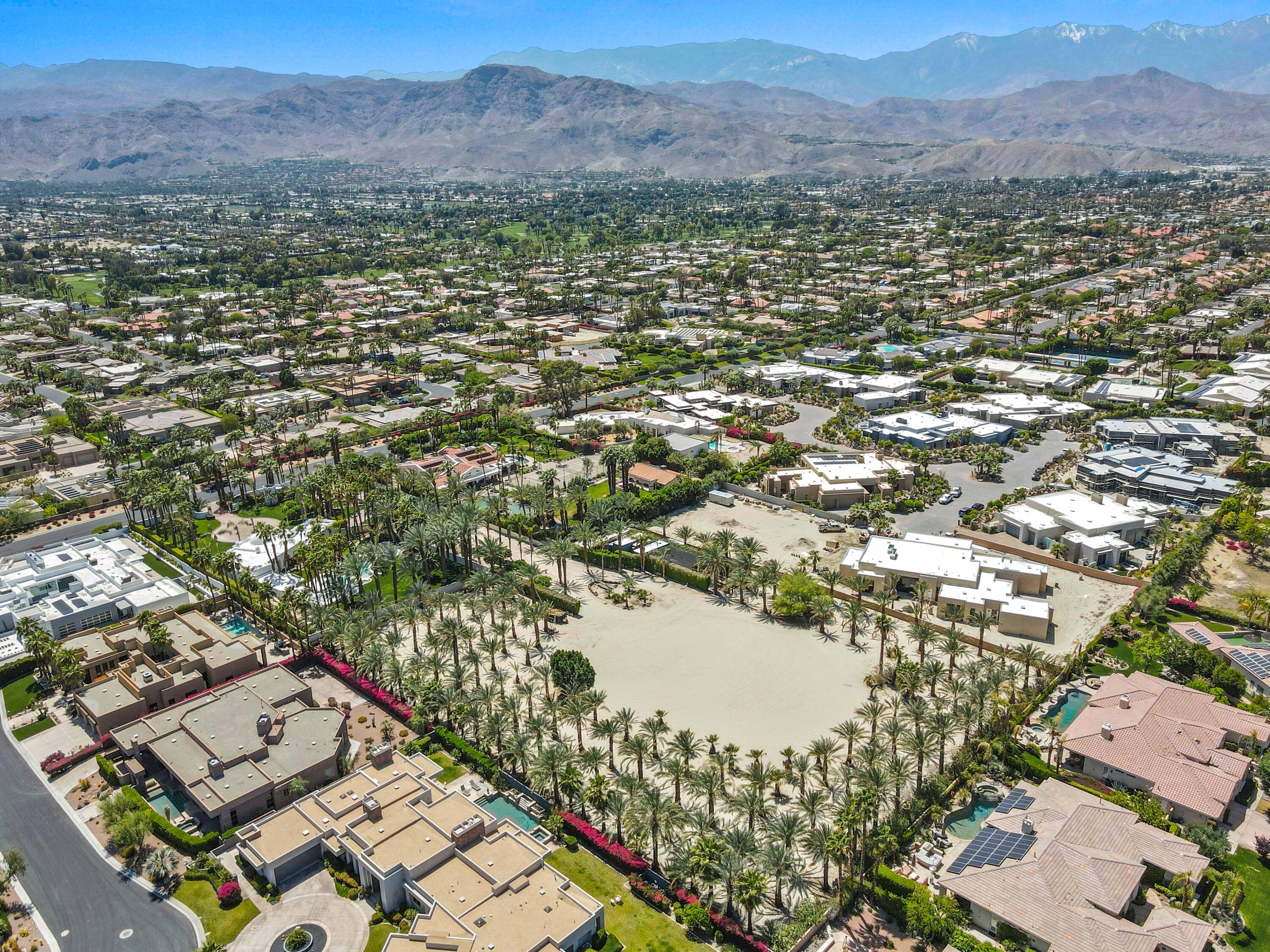 71246 Cypress Lane Rancho Mirage, CA 92270 - Photo 26 of 30 a view of a city with a lake