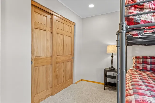 a view of front door with wooden floor