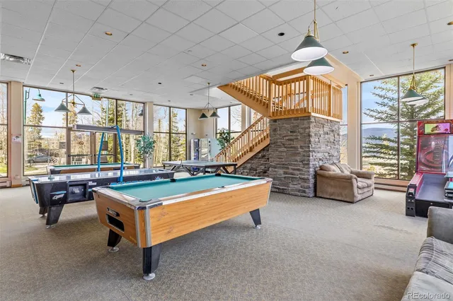 a swimming pool with a outdoor seating