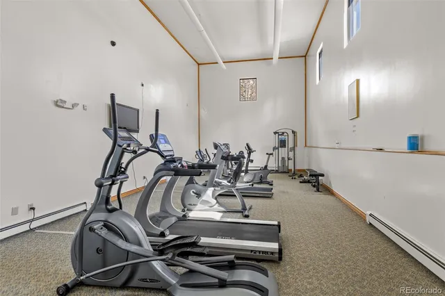 a view of a town with mountains in the background