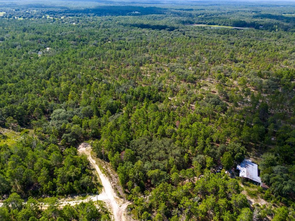 6474 Golden Oak Lane Keystone Heights, FL 32656 - Photo 14 of 18 a view of a lush green field