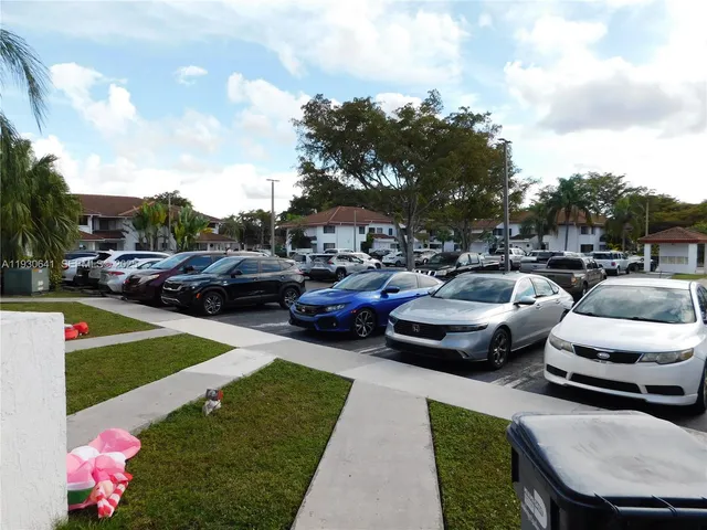 a cars parked in front of a house