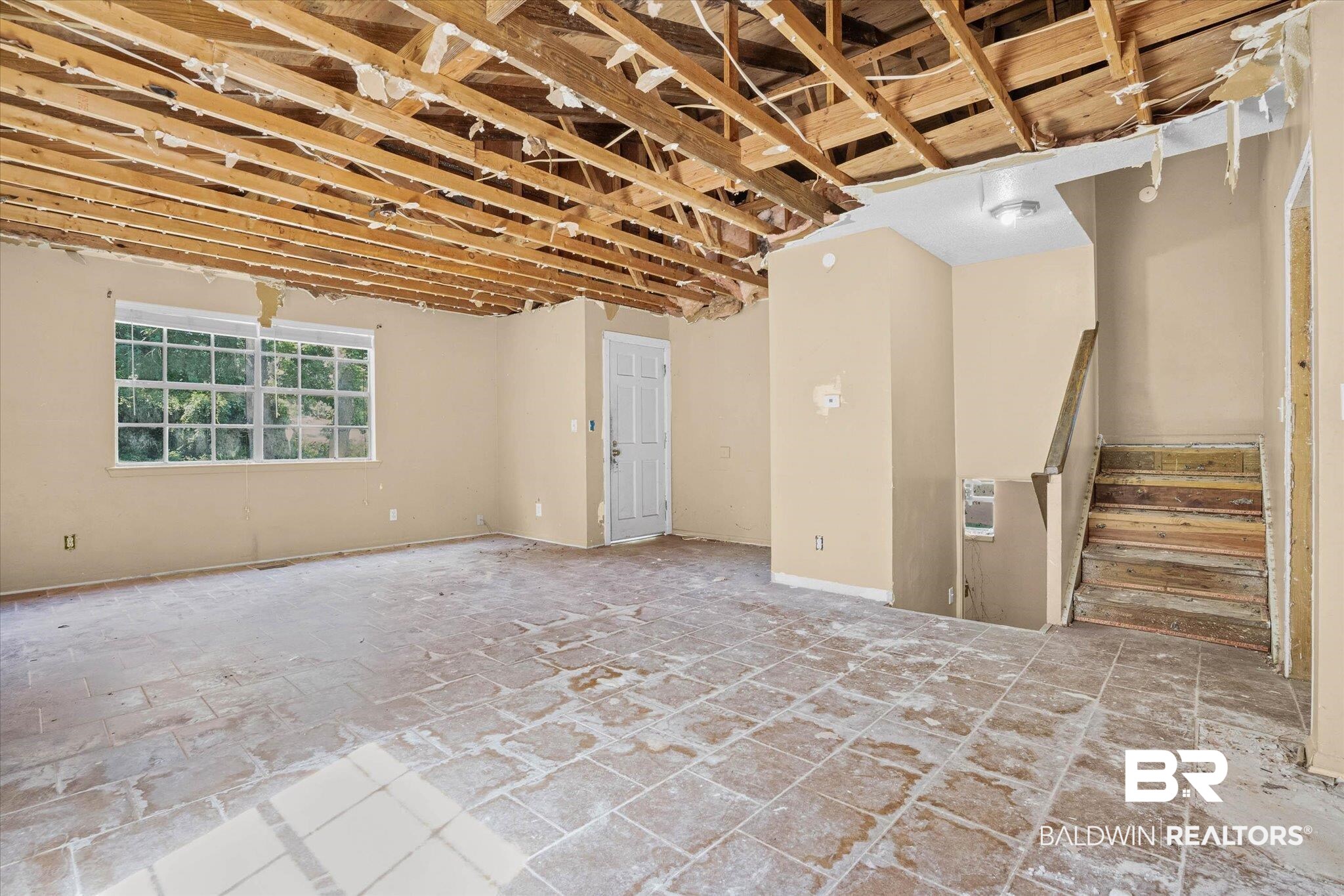 401 Frederick Avenue Fairhope, AL 36532 - Photo 4 of 36 Exposed ceiling joists provide an open framework for renovation