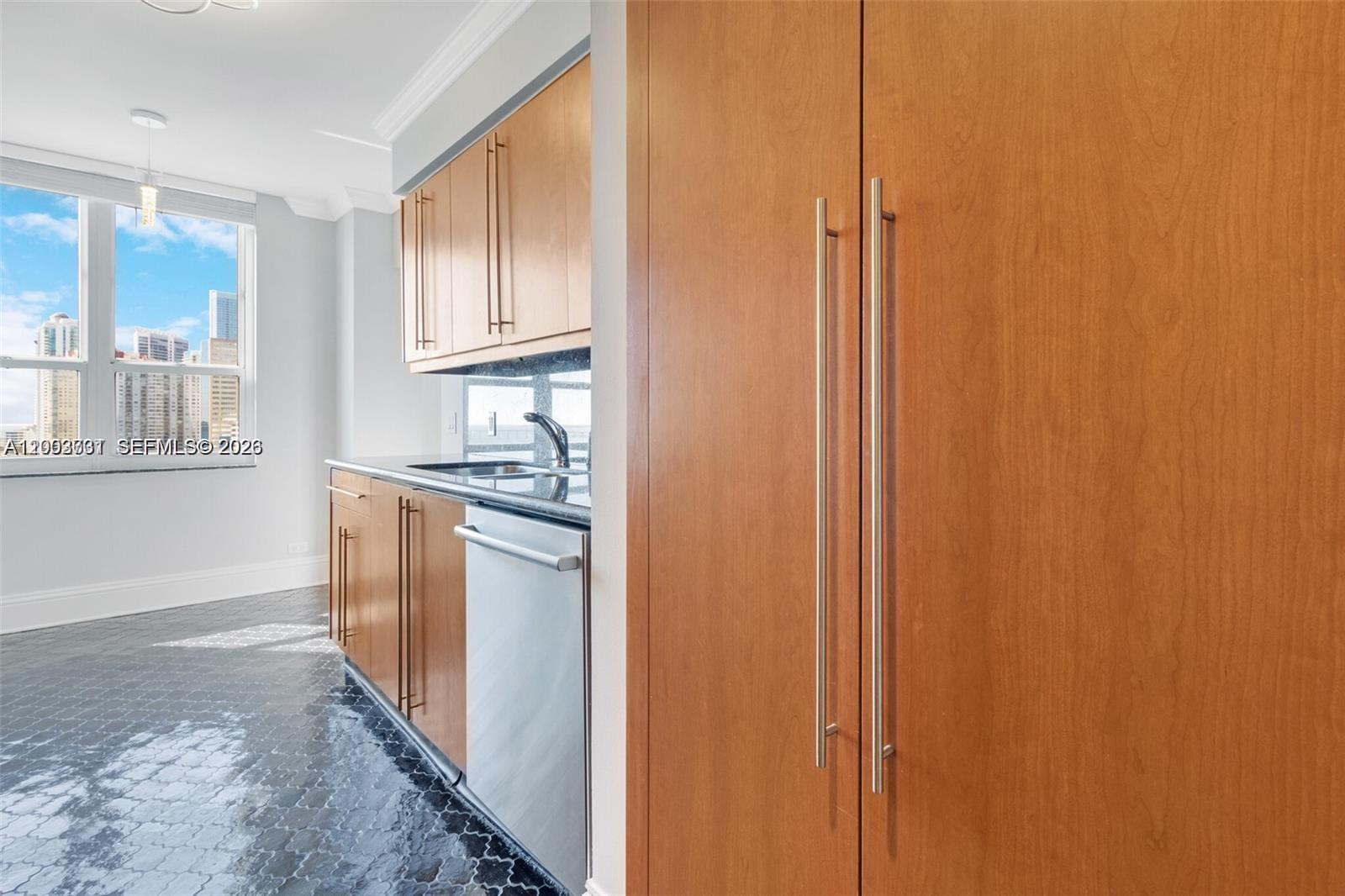 701 Brickell Key Boulevard, Unit 2103 Miami, FL 33131 - Photo 14 of 48 GREAT CABINET SPACE INCLUDING LARGE PANTRY
