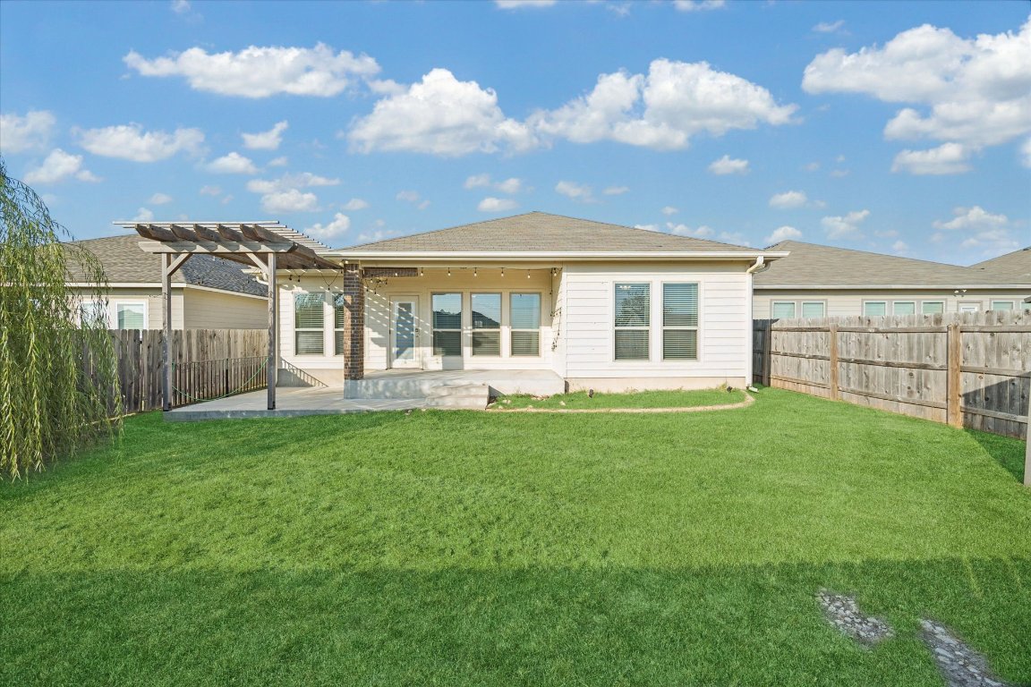 7517 Hickman Street Temple, TX 76502 - Photo 16 of 16 a view of a house with backyard porch and garden